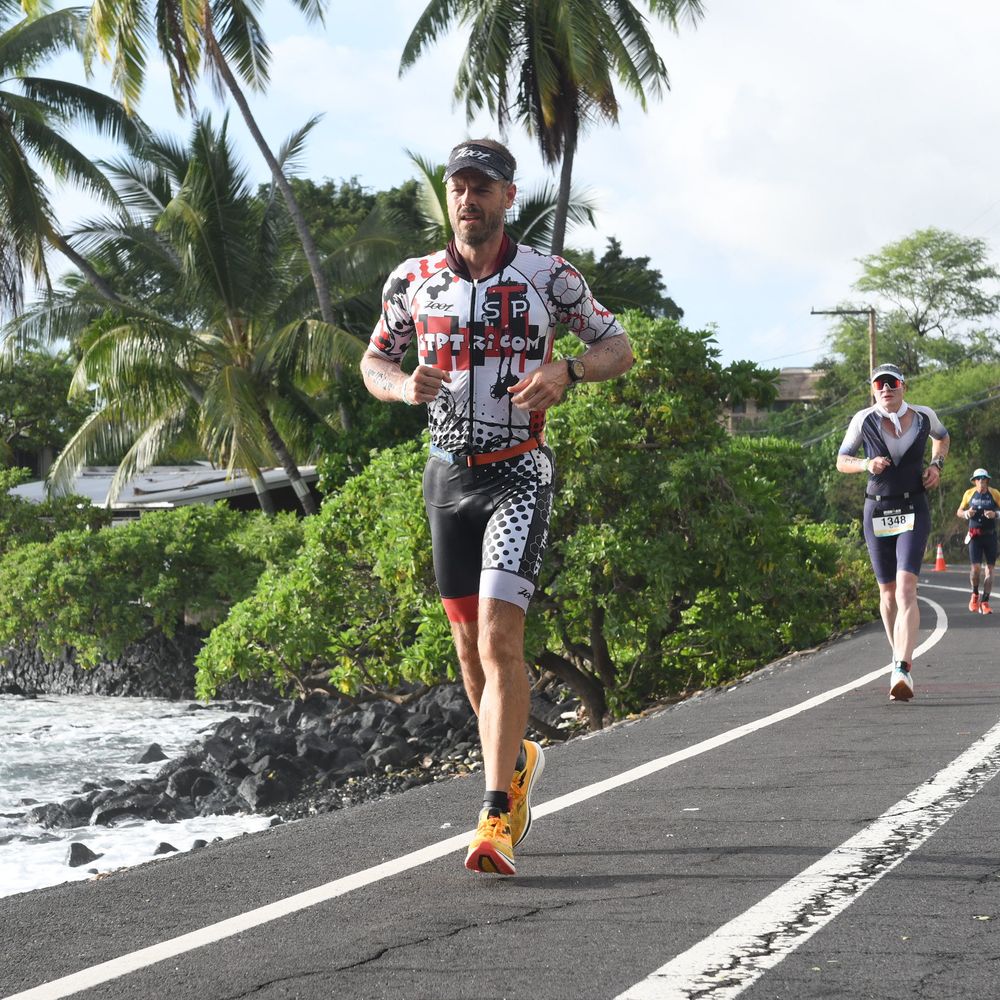 Ryan Falkenrath running the Kona IRONMAN run course along the coast